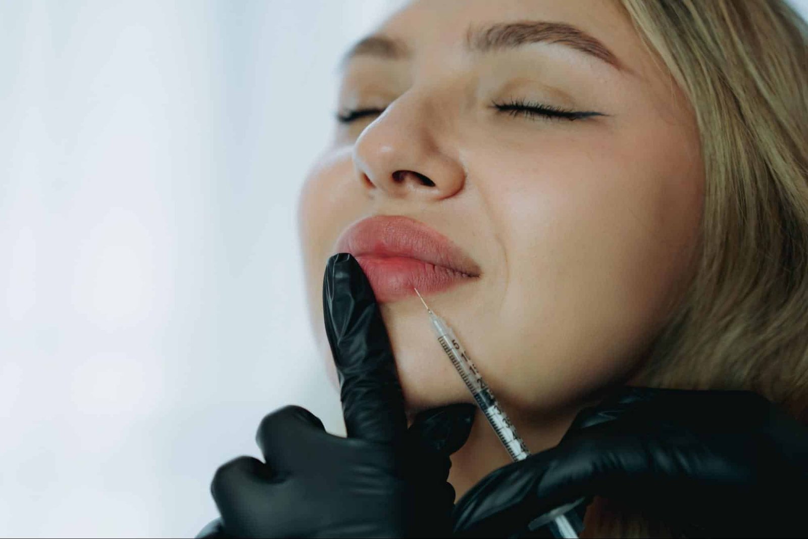 woman getting lip enhancement