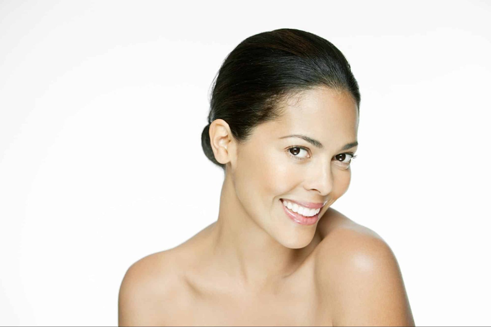 beautiful woman smiling, representing the results that a facial aesthetics clinic in Weslaco, TX can provide