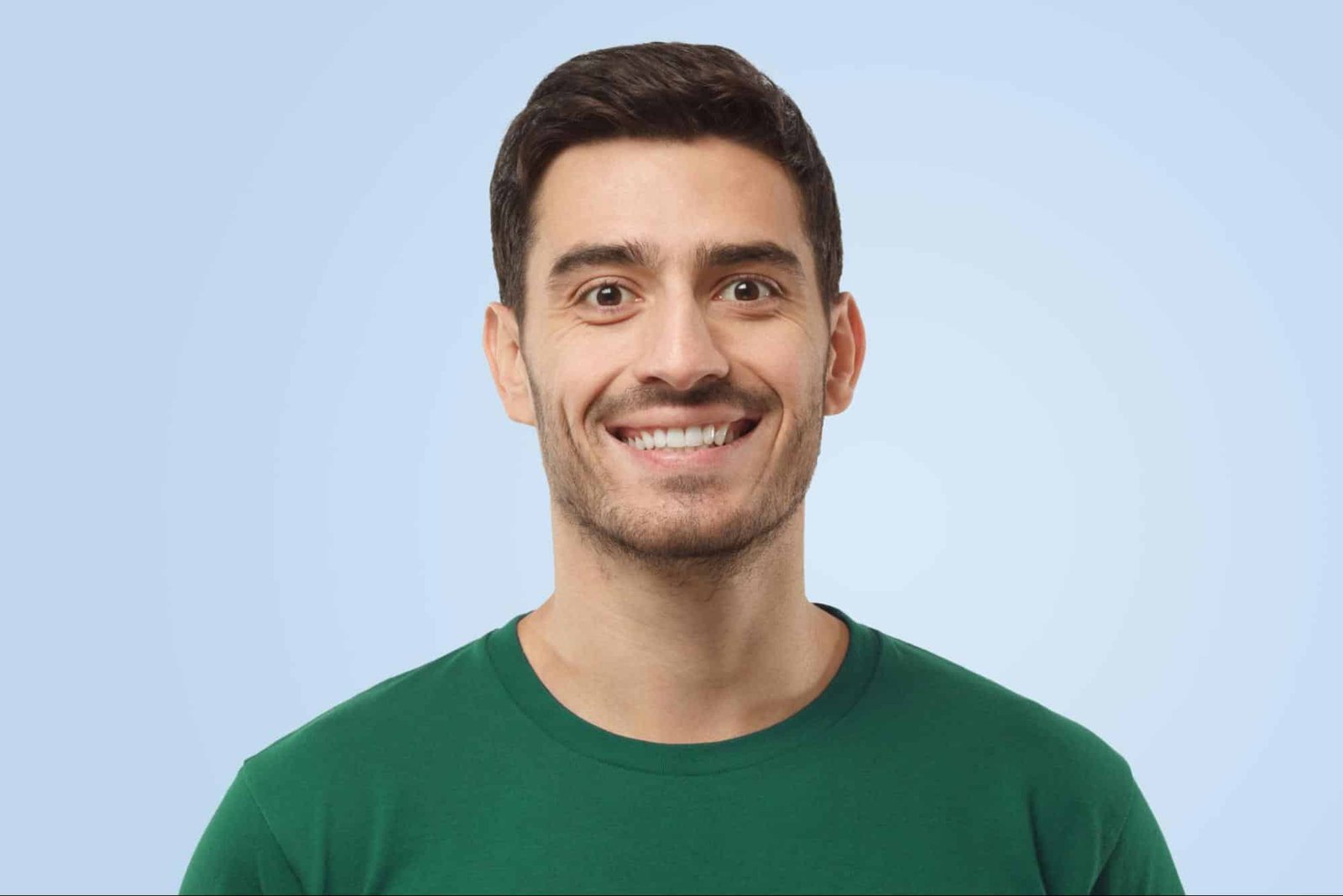 attractive man in green shirt