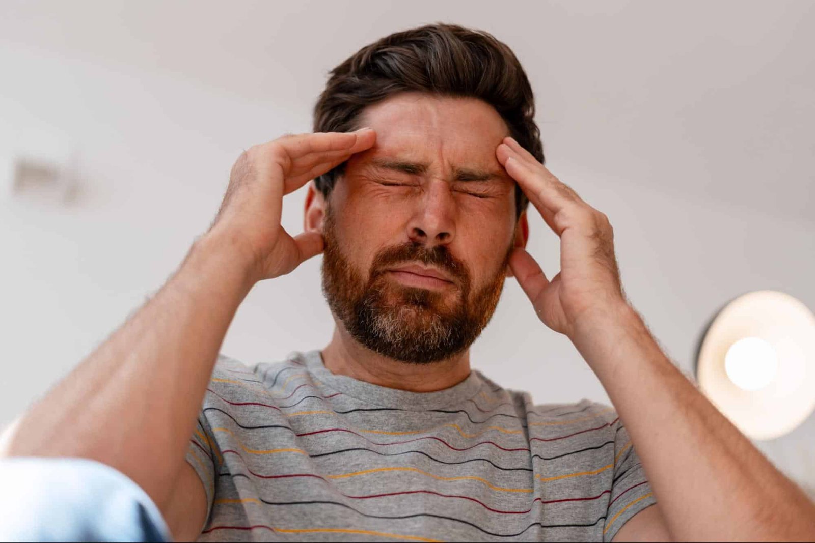 man with migraine