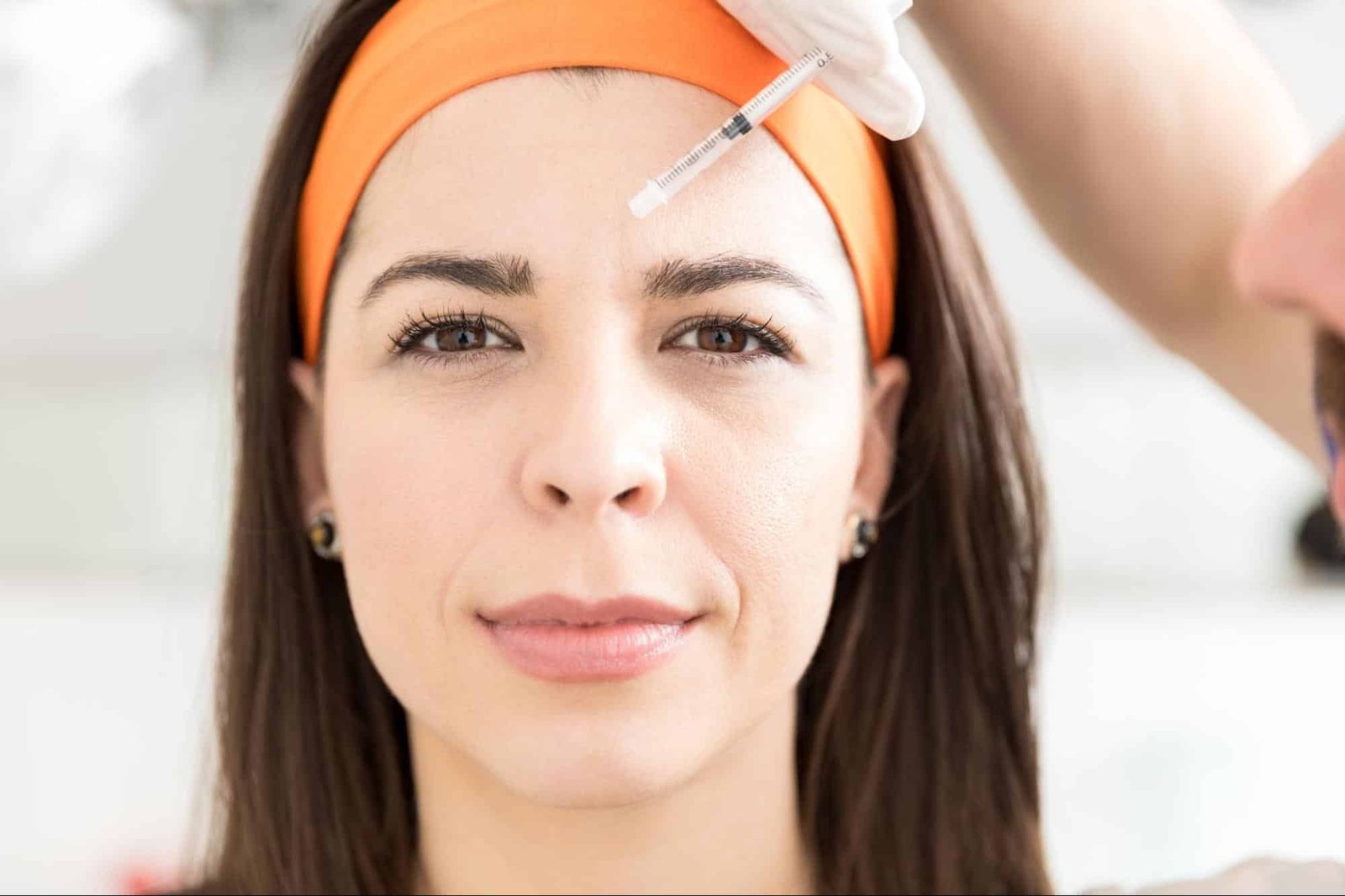 woman receiving facial injection