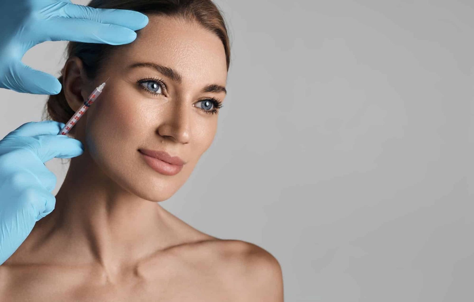 woman getting facial injection