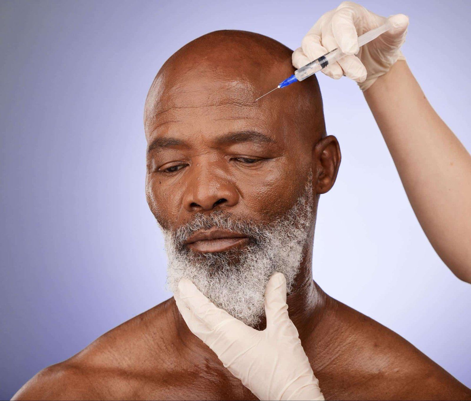 man receiving facial injection