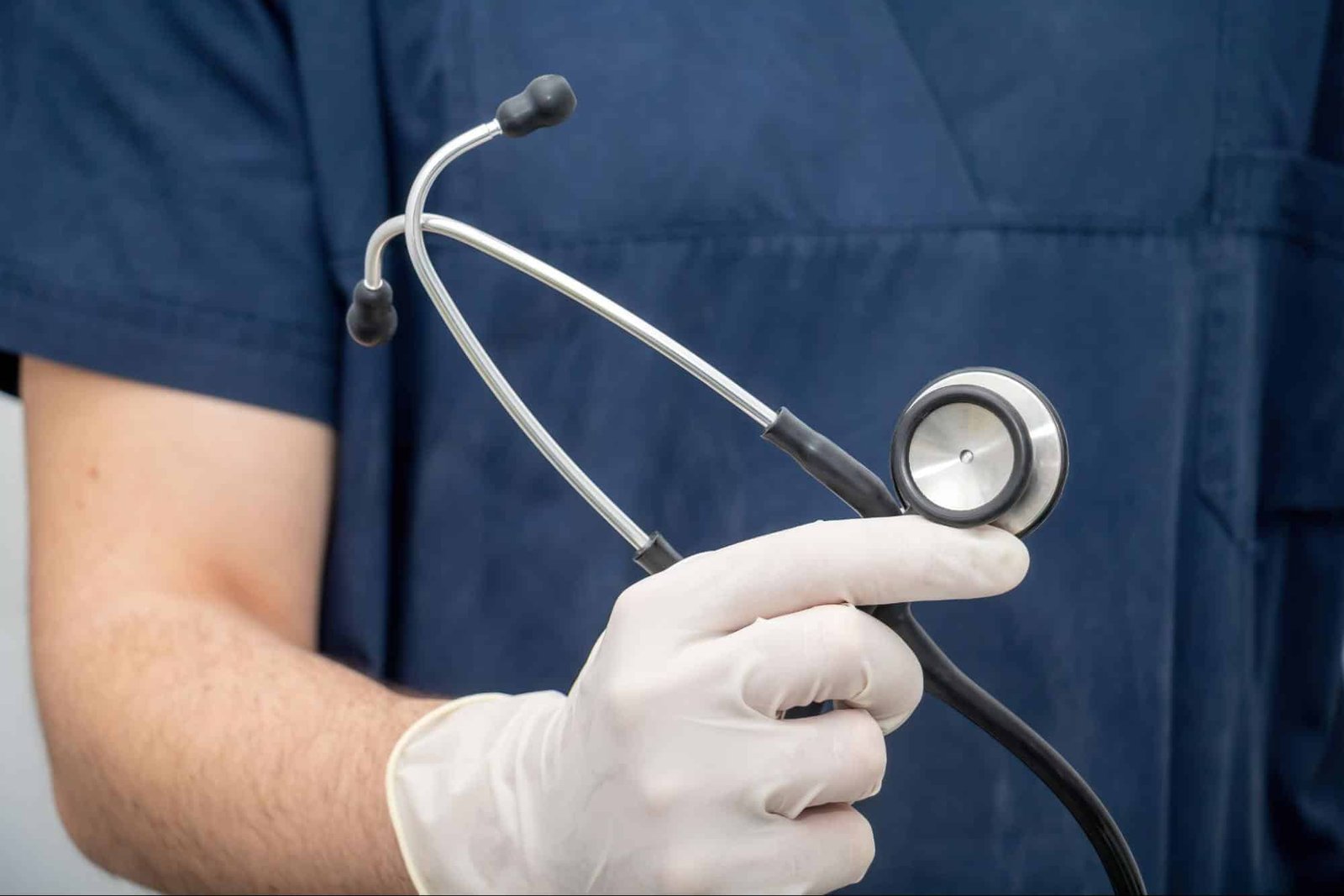 person holding stethoscope