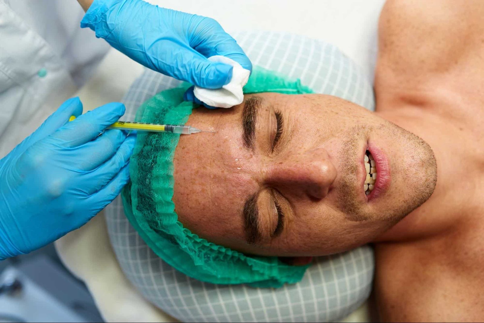 man receiving facial injection