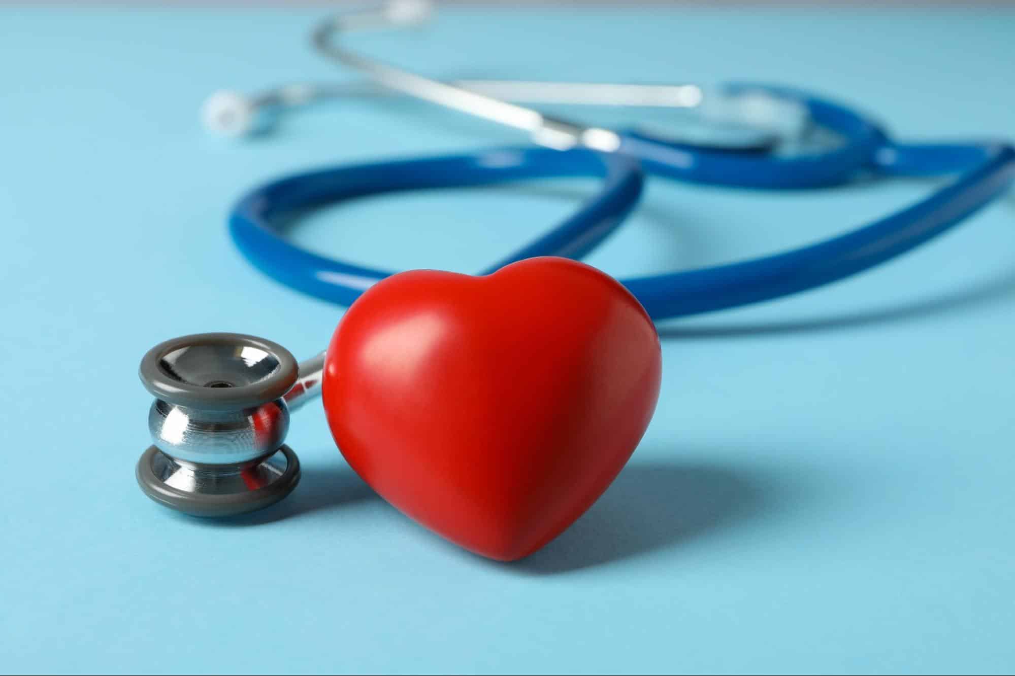 Red heart with stethoscope symbolizing healthcare services
