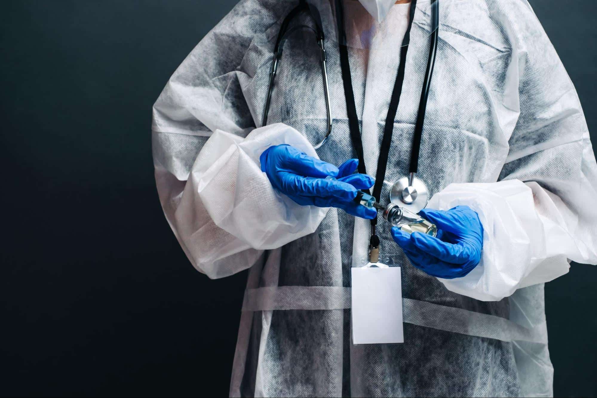 Healthcare provider preparing a vaccine injection, representing preventive care clinic services in Weslaco, TX.