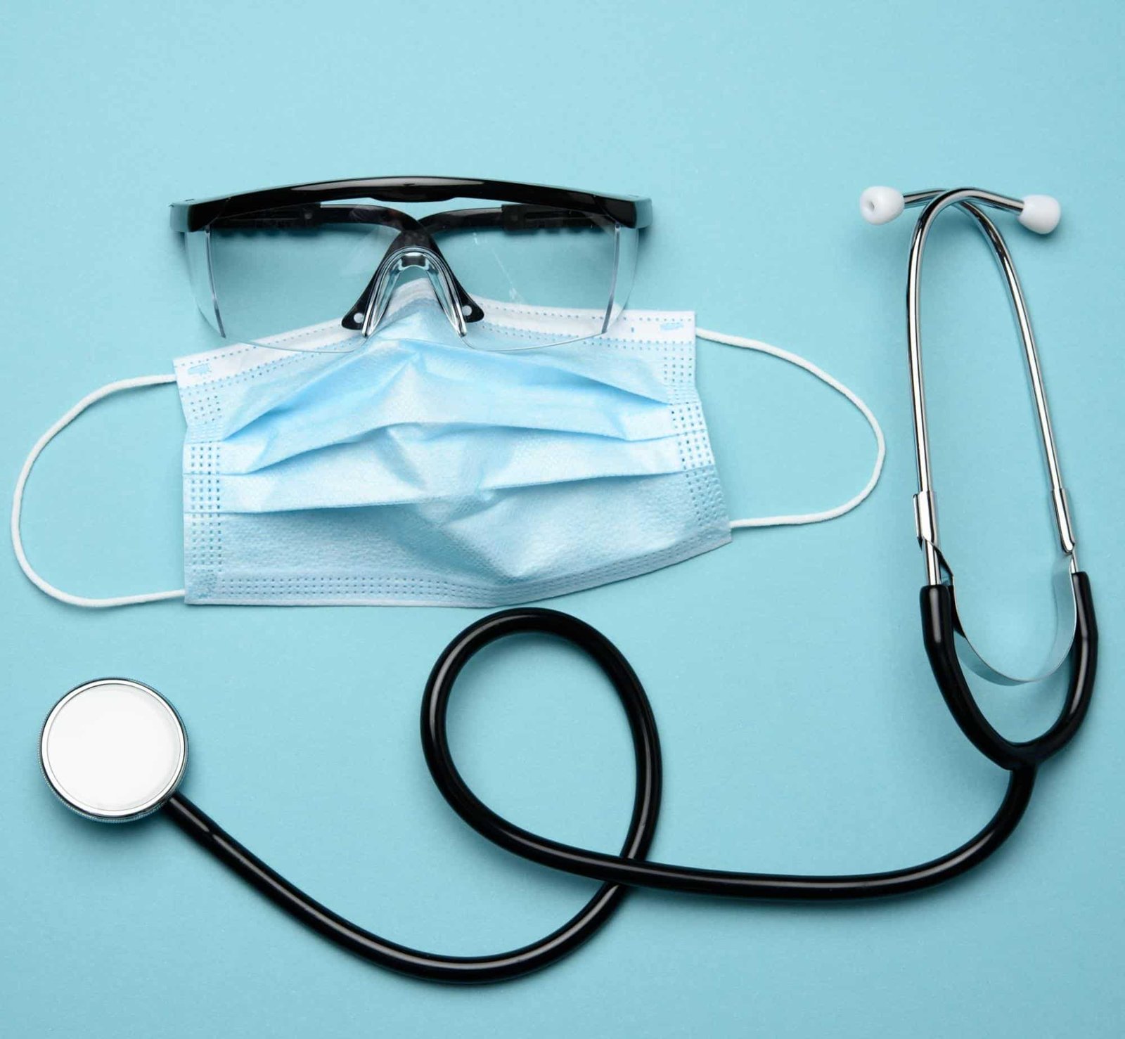 face mask, stethoscope, and lab goggles