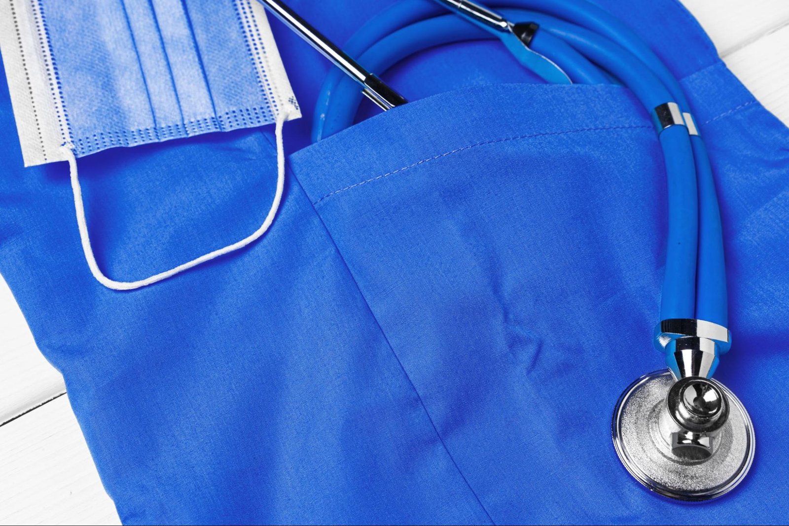 medical uniform with stethoscope and face mask