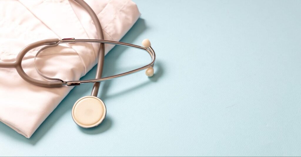stethoscope and lab gown, representing wellness check in Weslaco, TX