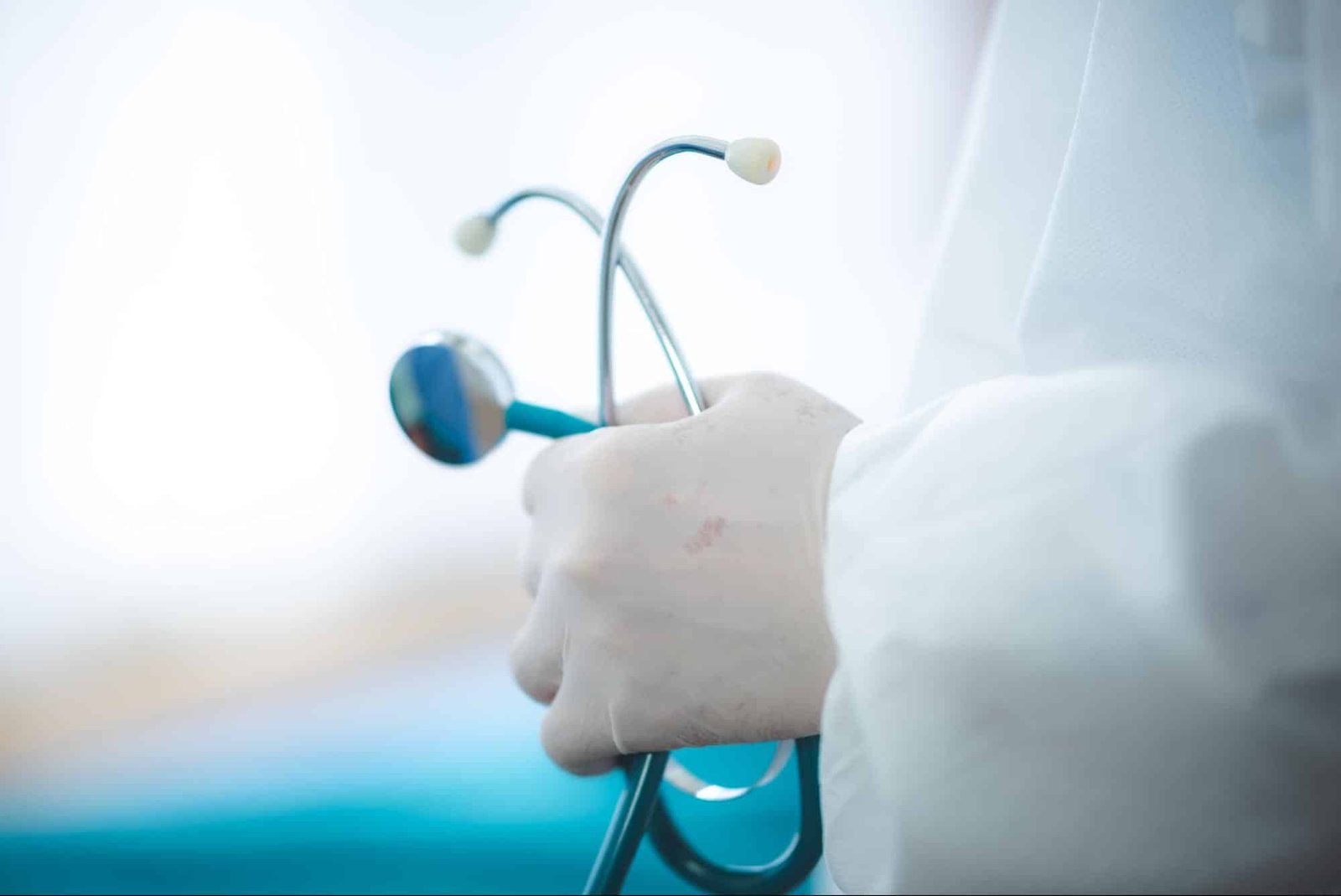 primary care provider holding stethoscope