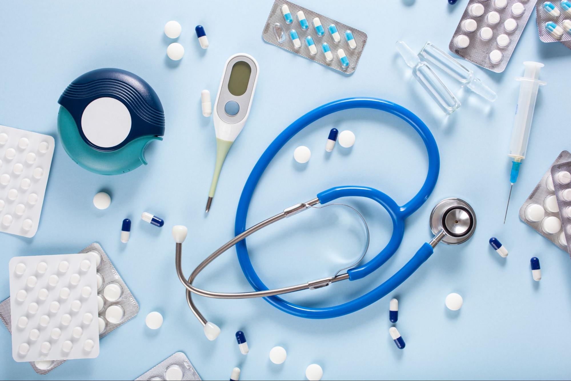 Stethoscope surrounded by pills, thermometer, and syringe showing after hours primary care provider Weslaco TX treatment options