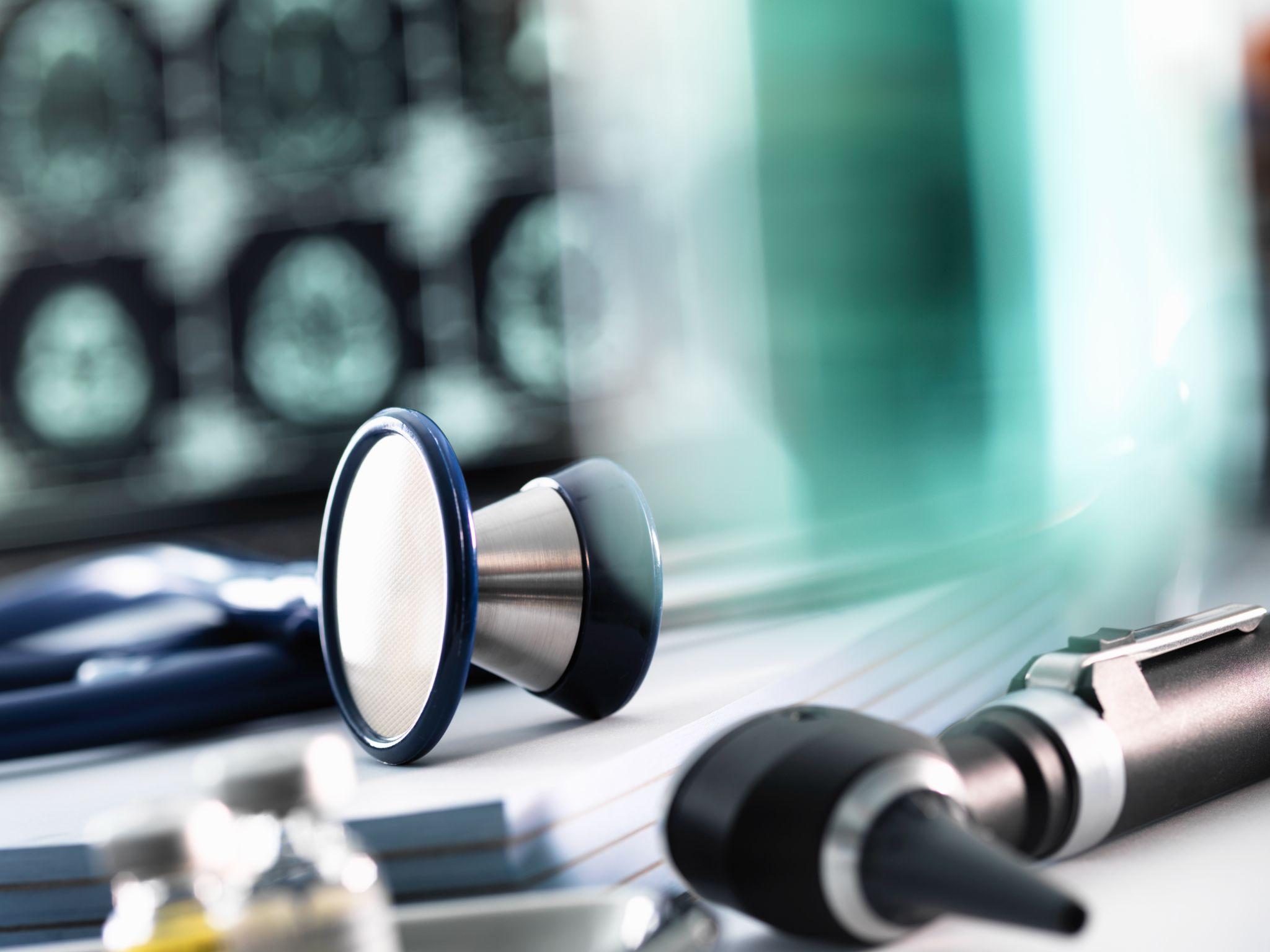 Stethoscope and medical tools on a desk, symbolizing preventive care