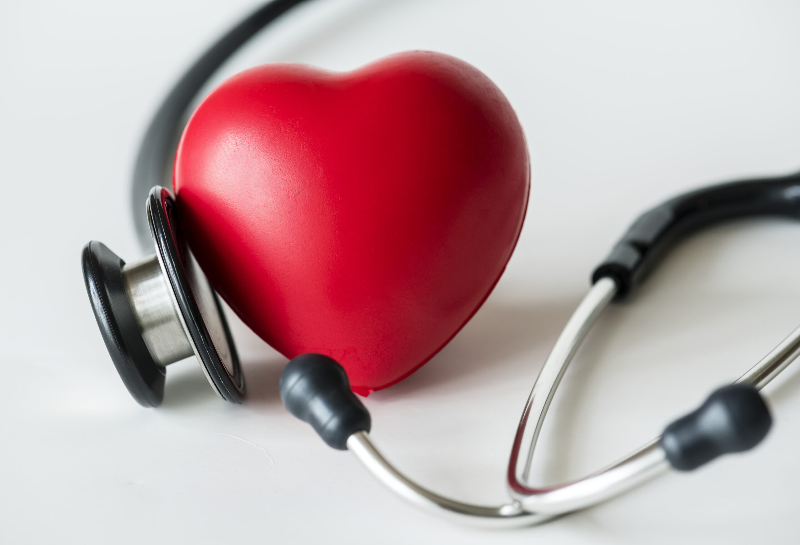 stethoscope and heart-shaped stress ball