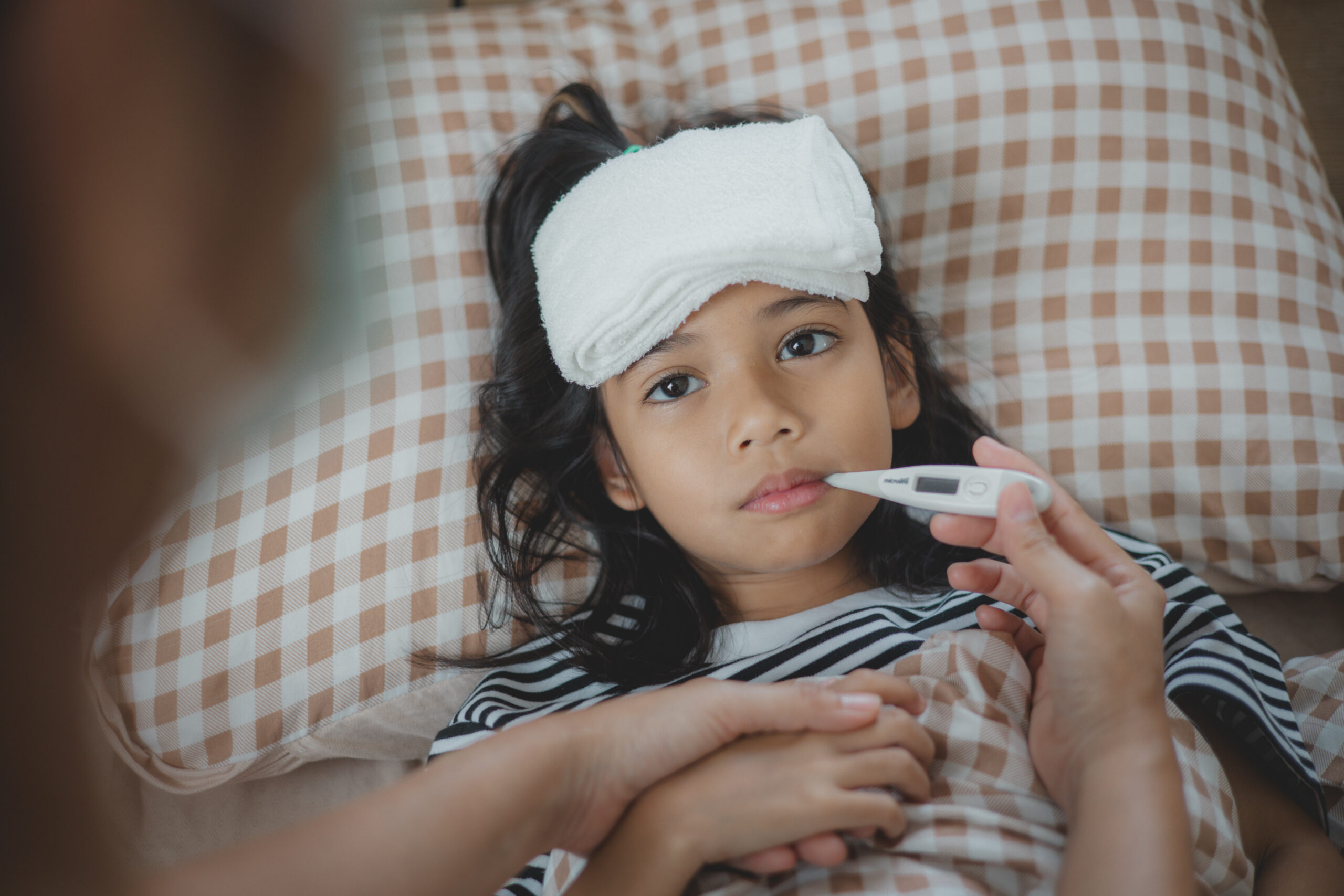 sick child, with thermometer