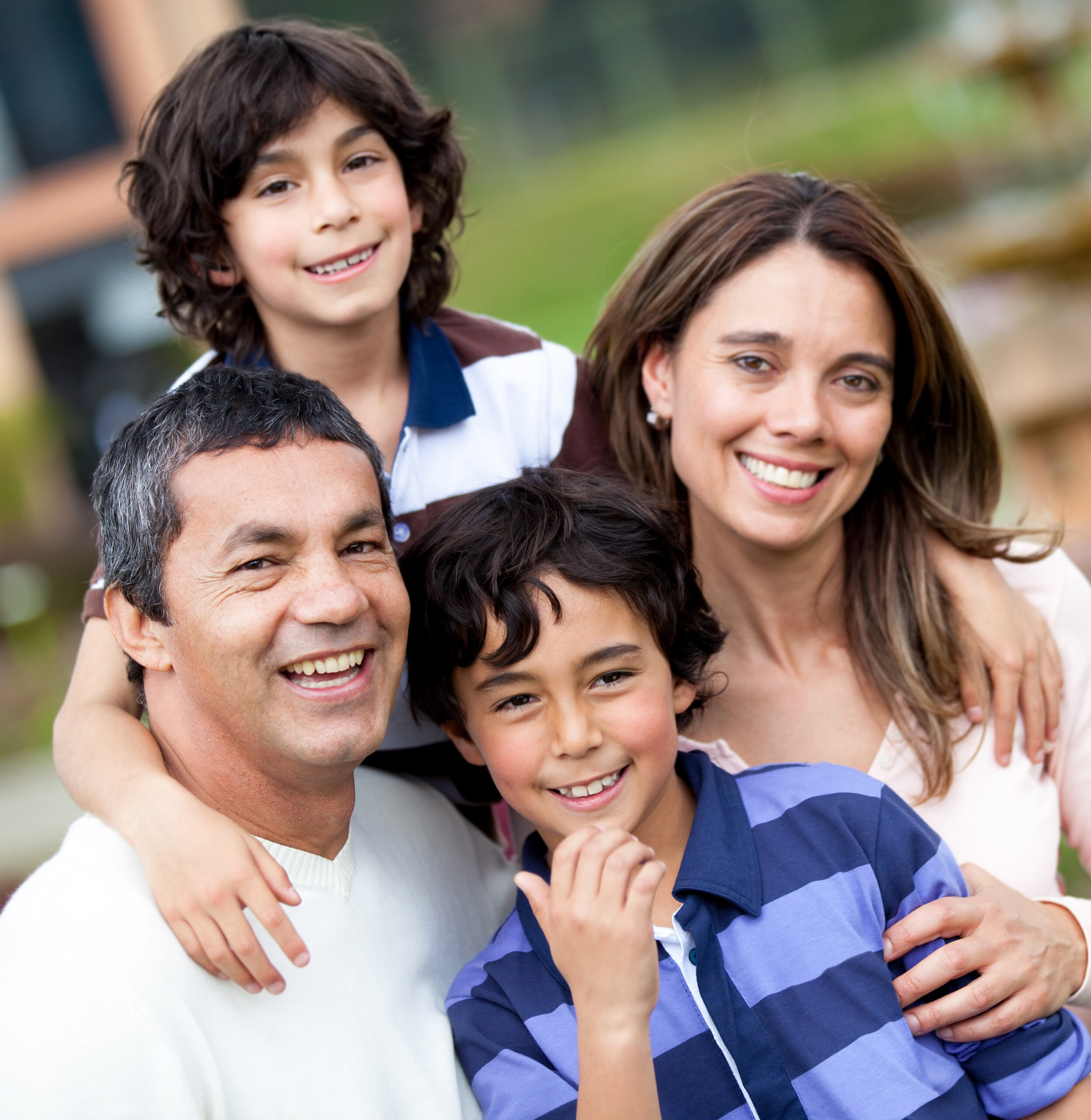happy family posing outdoors