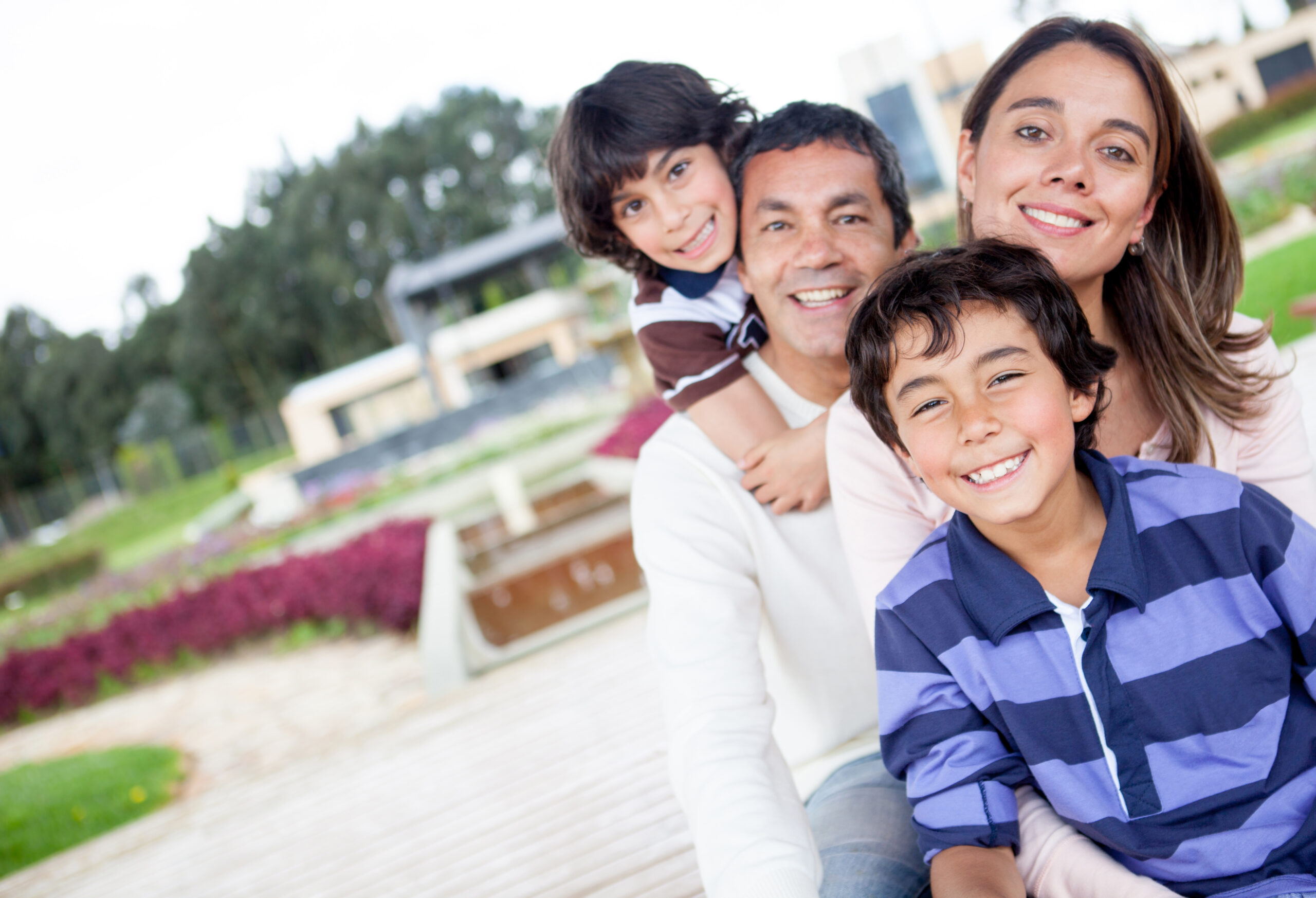 smiling family outdoors
